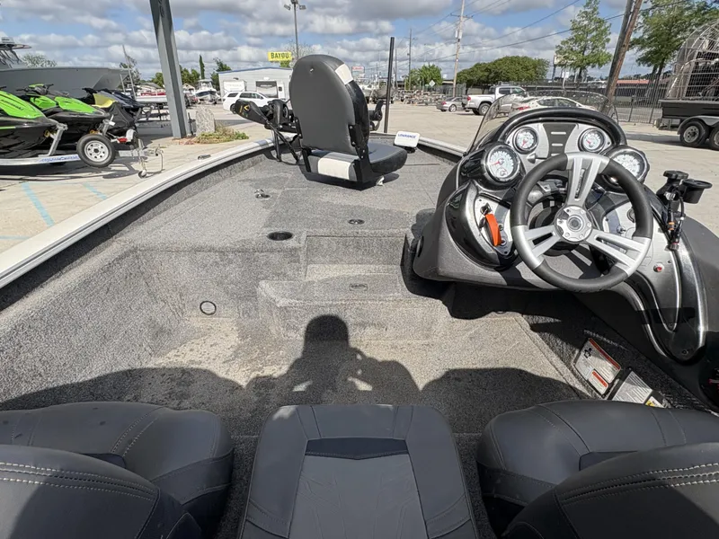 Slide: The Image of 2020 Tracker Pro Team 175 boat interior with steering console and seating. - 10