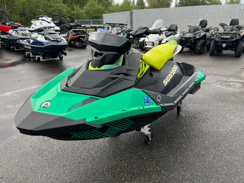 Slide: The Image of 2019 Sea-Doo Spark 2up 900 H.O. ACE jet ski in a parking lot. - 3