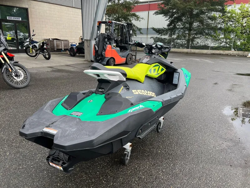 Slide: The Image of 2019 Sea-Doo Spark 2up 900 H.O. ACE jet ski in a service area. - 5