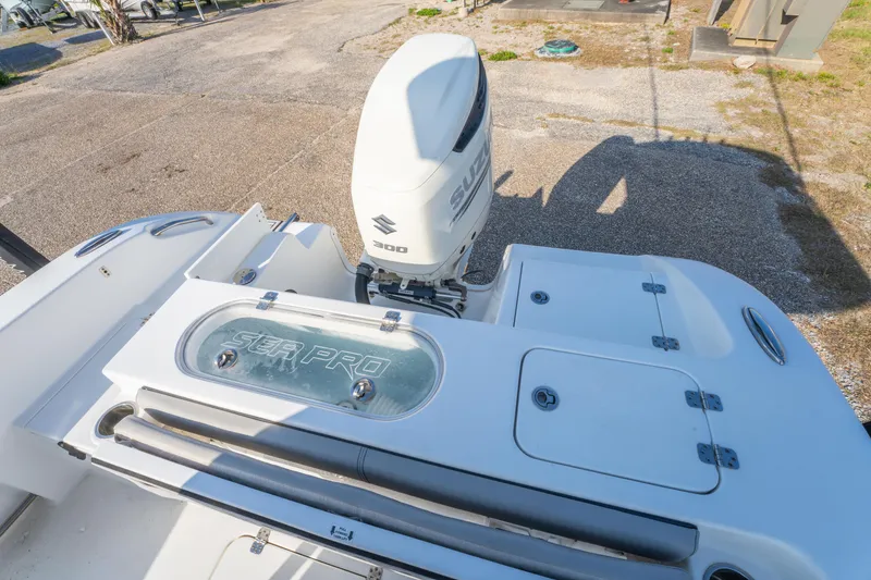 Slide: The Image of 2019 Sea Pro 239 DLX boat with Suzuki 300 engine, rear deck view. - 11