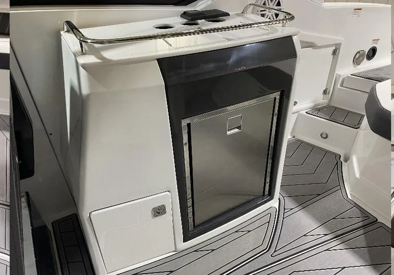 Slide: The Image of 2023 Monterey 298 Super Sport boat interior with sleek design and modern amenities. - 15