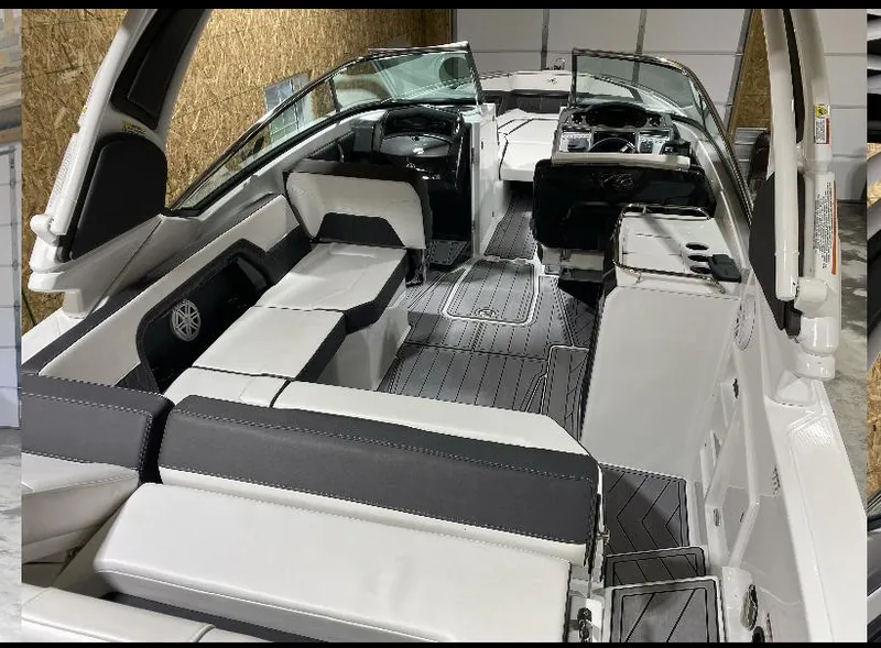 Slide: The Image of 2023 Monterey 298 Super Sport boat interior with sleek seating and modern design. - 8