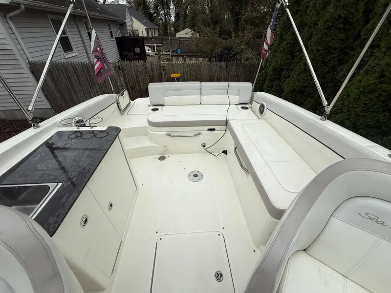 Slide: The Image of 2012 Sea Ray 280 Sundeck boat interior with spacious seating and sleek design. - 24