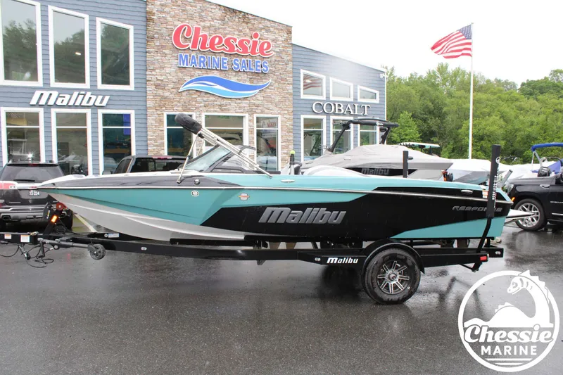 Slide: The Image of 2024 Malibu TXi Mo boat at Chessie Marine Sales dealership. - 6