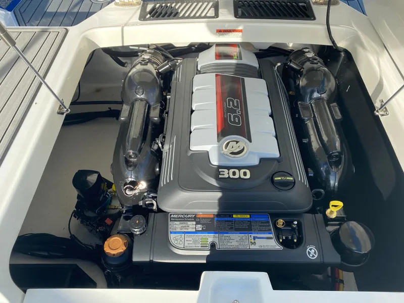 Slide: The Image of 2020 Monterey 238 Super Sport engine compartment with Mercury 6.2L 300 HP engine. - 15