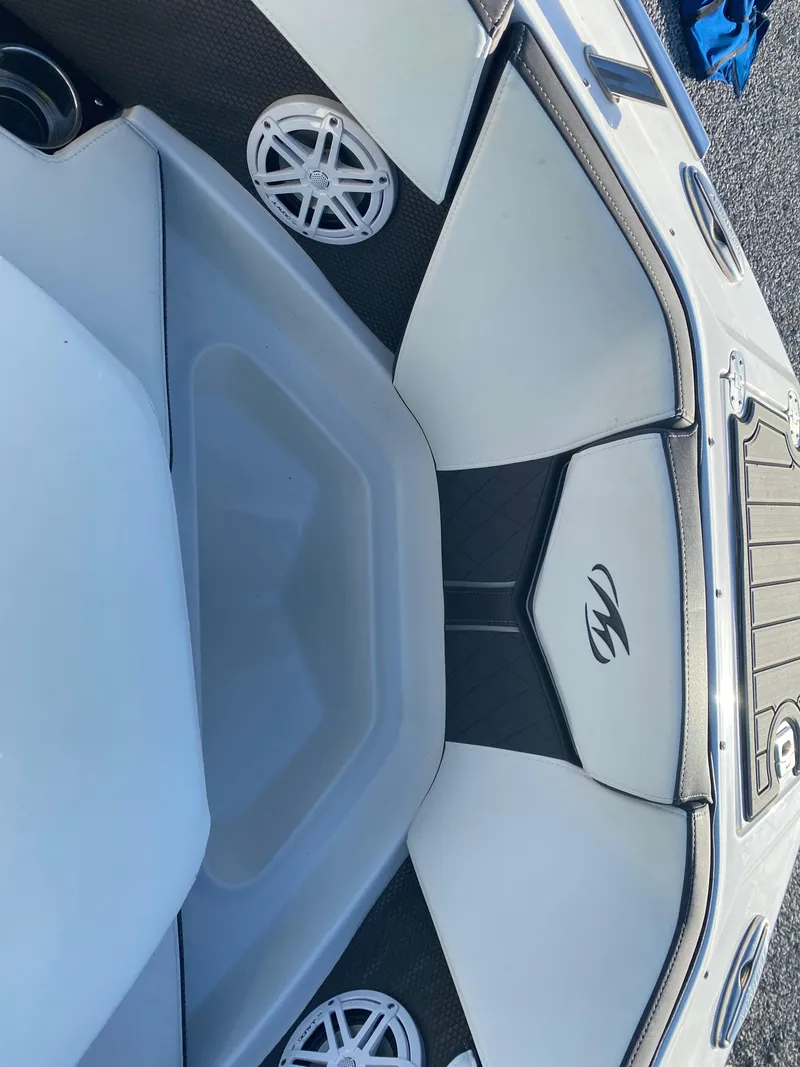 Slide: The Image of 2020 Monterey 238 Super Sport boat interior with sleek seating and speaker system. - 24