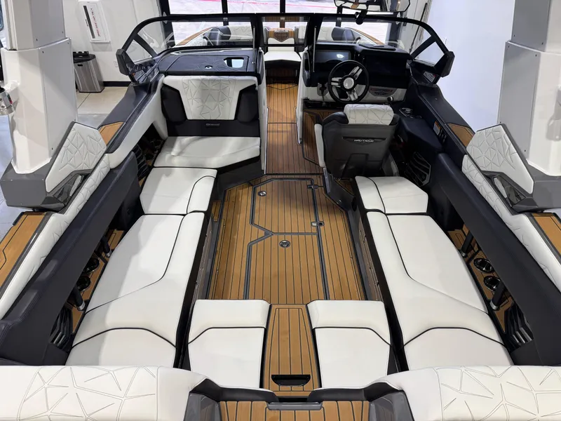 Slide: The Image of 2023 Nautique Super Air Nautique G23 Paragon interior with luxurious seating and sleek design. - 16