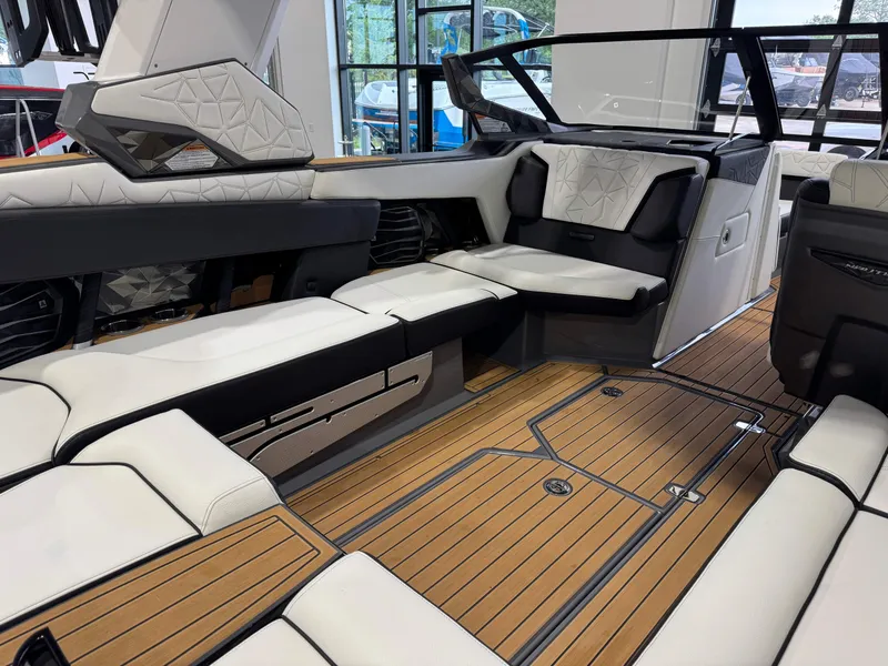 Slide: The Image of Luxurious interior of 2023 Nautique Super Air Nautique G23 Paragon boat with elegant seating. - 17