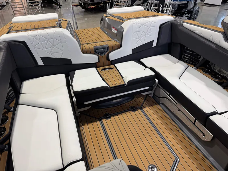 Slide: The Image of 2023 Nautique Super Air Nautique G23 Paragon interior with luxurious seating and teak flooring. - 19