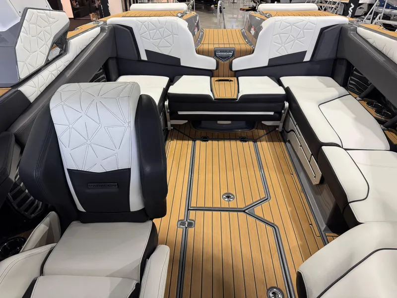 Slide: The Image of 2023 Nautique Super Air Nautique G23 Paragon interior with luxurious seating and teak flooring. - 25
