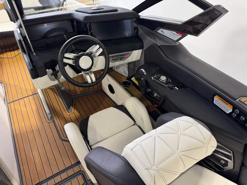 Slide: The Image of 2023 Nautique Super Air Nautique G23 Paragon interior with sleek design and modern controls. - 28