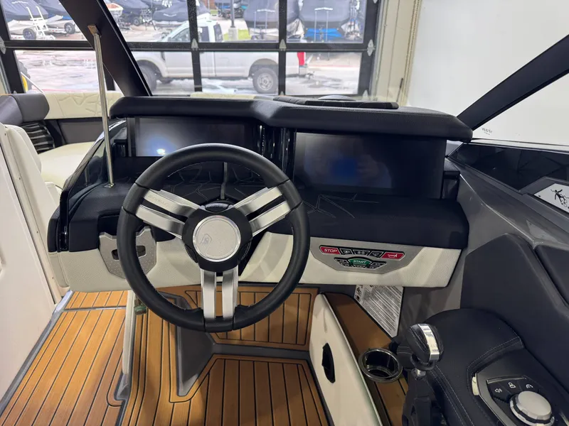 Slide: The Image of 2023 Nautique Super Air Nautique G23 Paragon helm with modern controls and sleek design. - 29