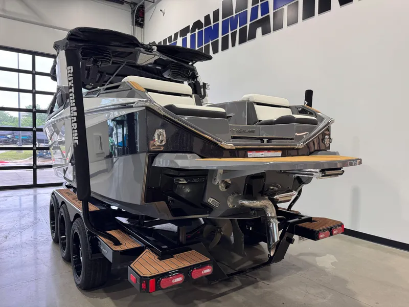 Slide: The Image of 2023 Nautique Super Air Nautique G23 Paragon boat on trailer in showroom. - 5