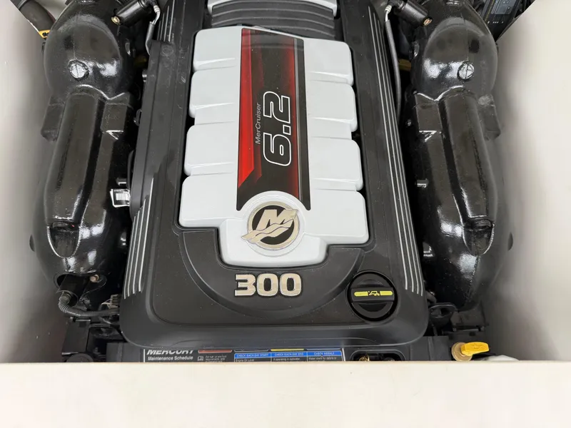 Slide: The Image of 2018 Crownline 235 SS boat engine, featuring a 6.2L 300 horsepower MerCruiser. - 10