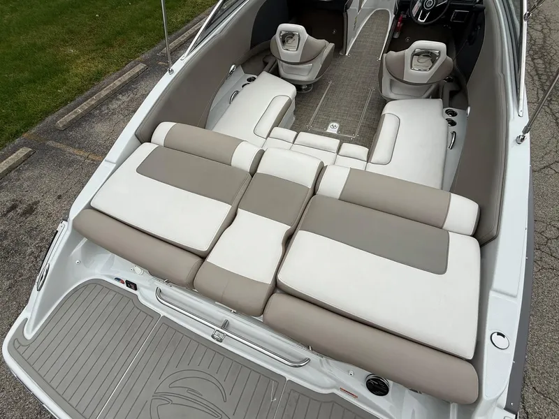 Slide: The Image of 2018 Crownline 235 SS boat interior with spacious seating and modern design. - 5