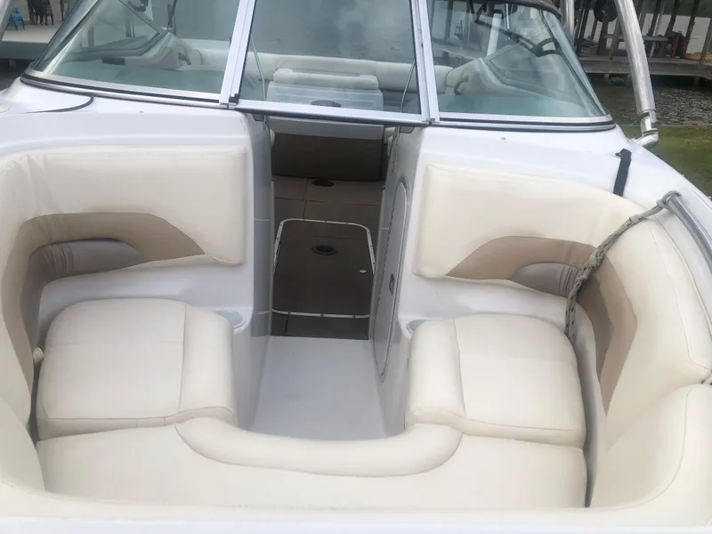 Slide: The Image of Interior view of a 1997 Chaparral 1930 SS boat with beige seating. - 7