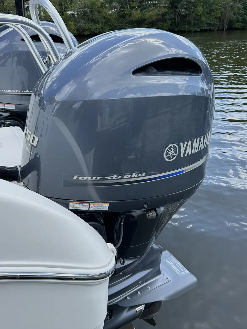 Slide: The Image of Yamaha four-stroke outboard motor on a 2021 World Cat 255 DC boat. - 14