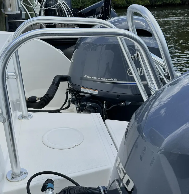 Slide: The Image of 2021 World Cat 255 DC boat with dual Yamaha 150 outboard engines. - 18