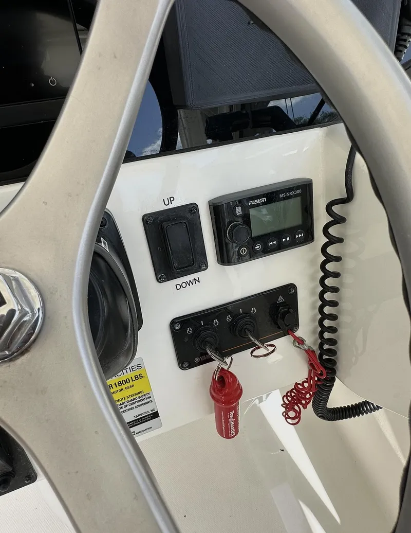 Slide: The Image of 2021 World Cat 255 DC helm with controls and steering wheel. - 33