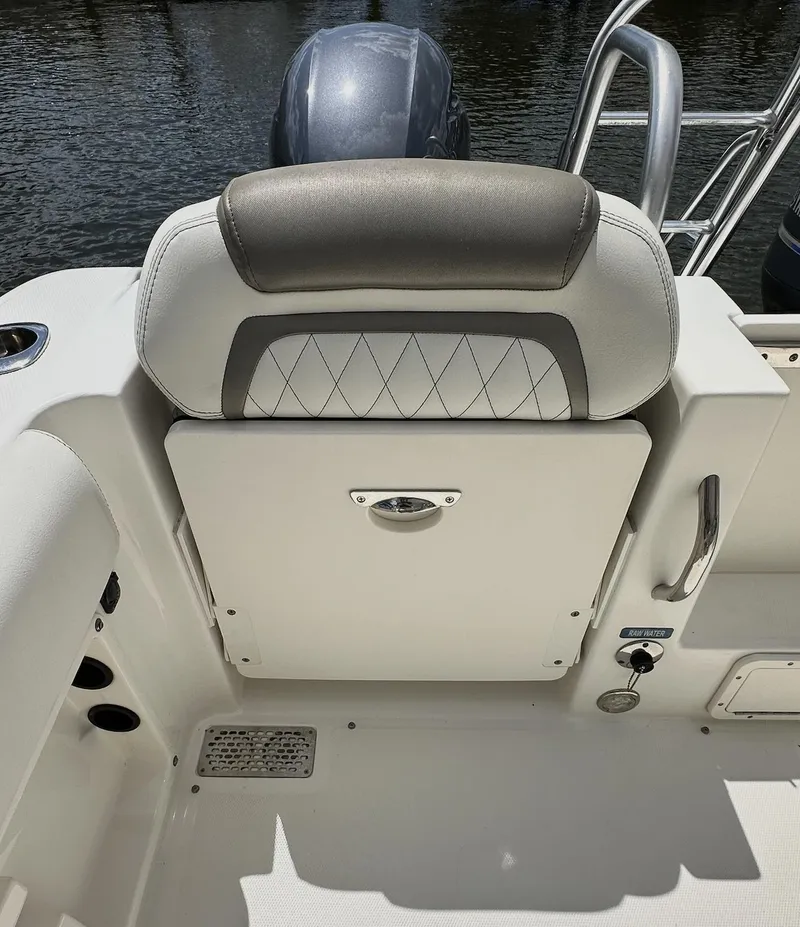 Slide: The Image of 2021 World Cat 255 DC boat seat with diamond-pattern upholstery and sleek design. - 43