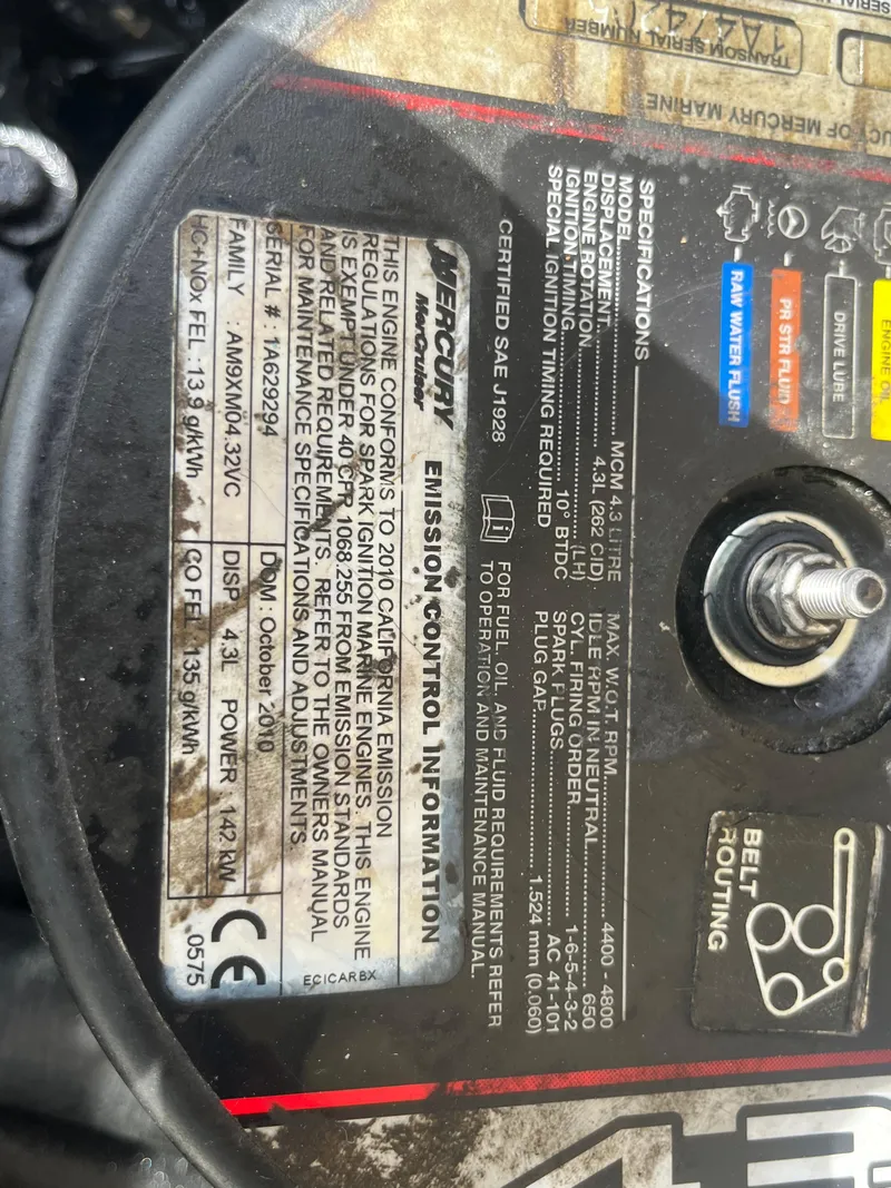 Slide: The Image of Close-up of a 2011 Bayliner 195 engine label showing specifications and emission control information. - 25