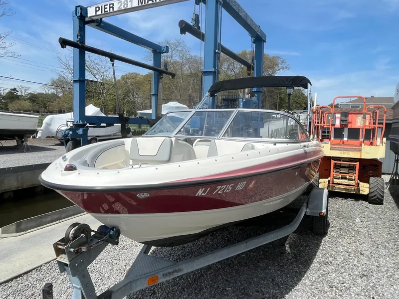 Slide: The Image of 2011 Bayliner 195 boat on trailer at marina, ready for launch. - 3