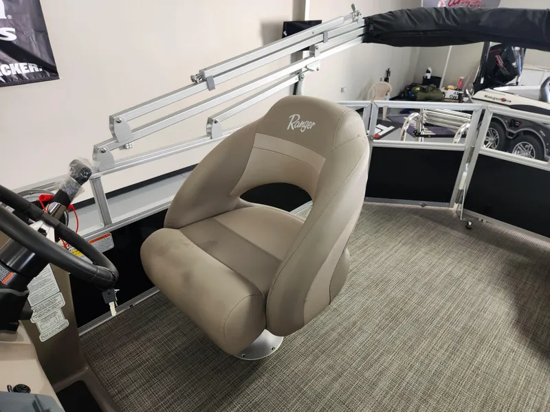 Slide: The Image of Captain's chair on a 2025 Ranger 200C boat, featuring a sleek design and comfortable seating. - 12