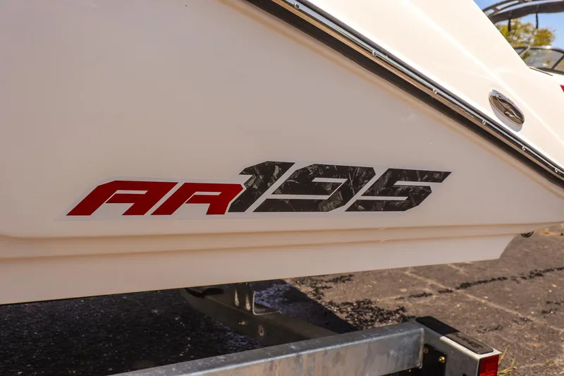 Slide: The Image of 2025 Yamaha Boats AR195 logo on boat hull, close-up view. - 17