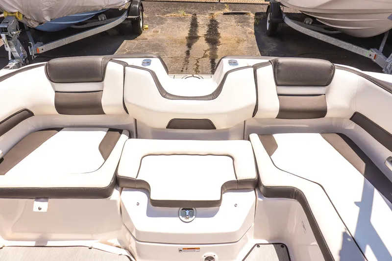 Slide: The Image of 2025 Yamaha Boats AR195 interior seating with sleek, modern design and comfortable upholstery. - 18