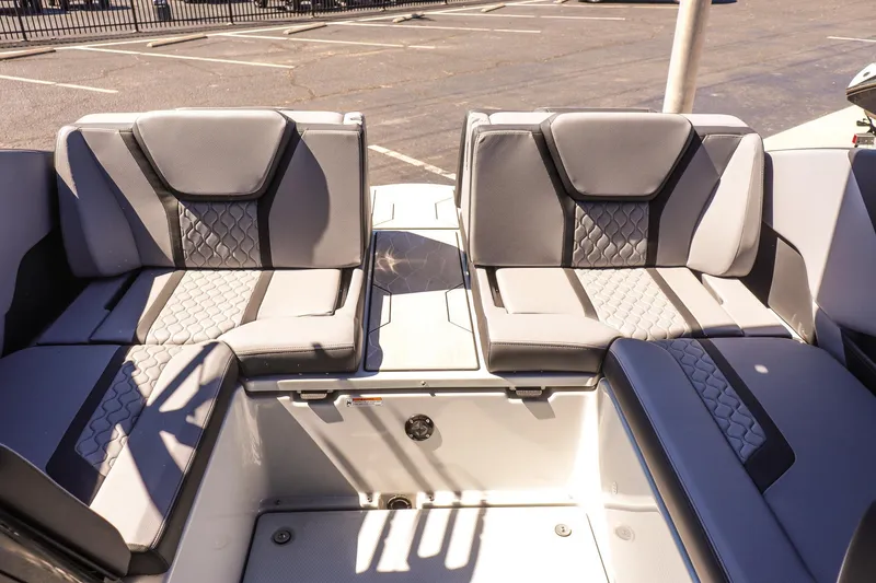 Slide: The Image of 2025 Yamaha Boats 255XD interior seating with modern gray upholstery design. - 17
