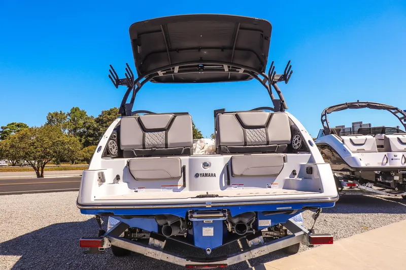 Slide: The Image of 2025 Yamaha Boats 255XD, rear view, showcasing sleek design and modern features. - 6