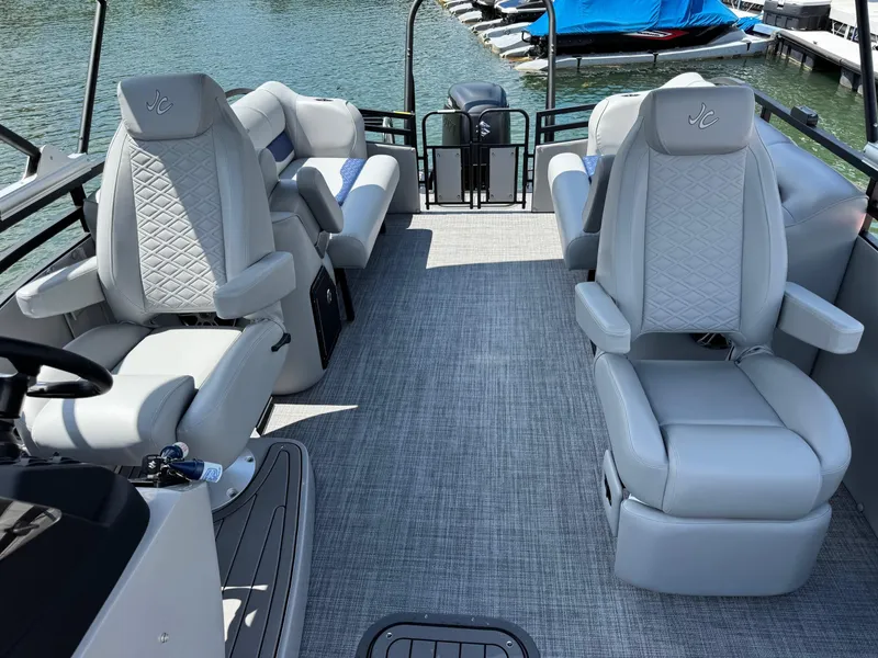 Slide: The Image of 2025 JC Neptoon Sport 23TT DSL pontoon boat with luxurious seating and modern design. - 7