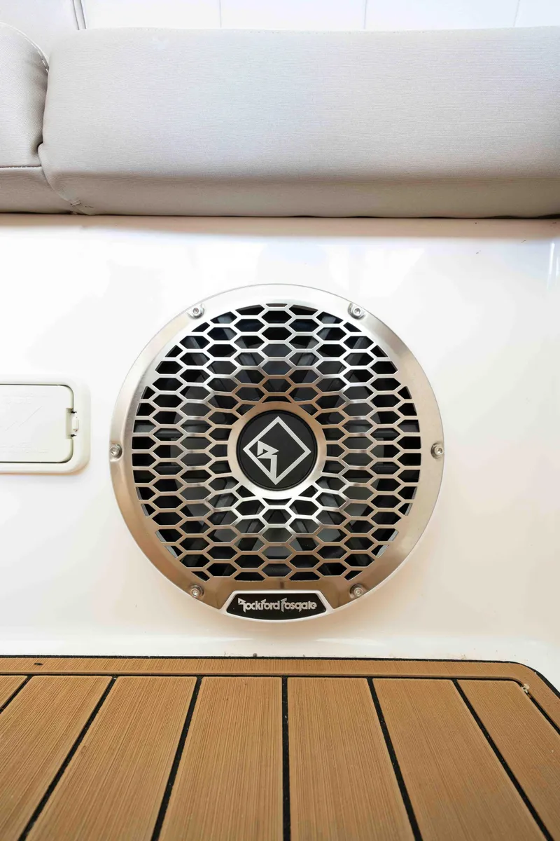 Slide: The Image of 2015 Regal 35 Sport Coupe speaker with Rockford Fosgate grille on teak deck. - 19