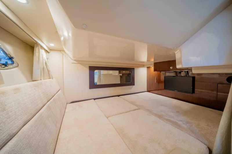 Slide: The Image of Interior cabin of 2015 Regal 35 Sport Coupe, featuring plush seating and modern design. - 25