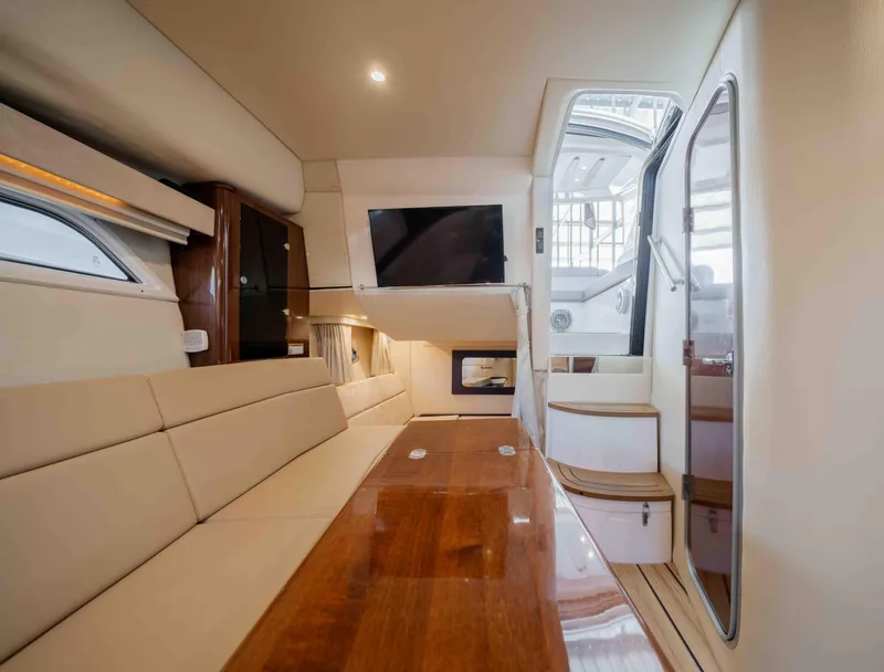 Slide: The Image of Interior of 2015 Regal 35 Sport Coupe, featuring luxurious seating and modern amenities. - 29