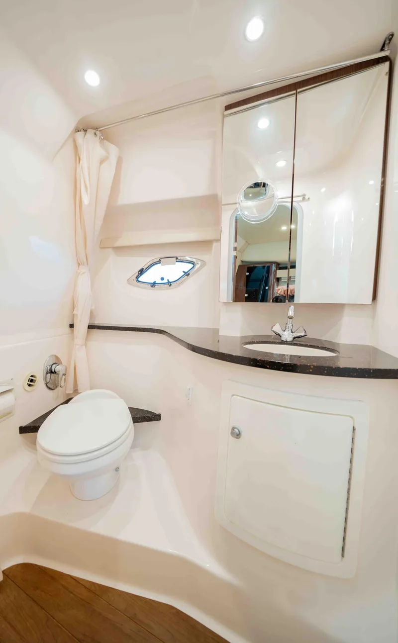 Slide: The Image of 2015 Regal 35 Sport Coupe bathroom with modern fixtures and sleek design. - 31