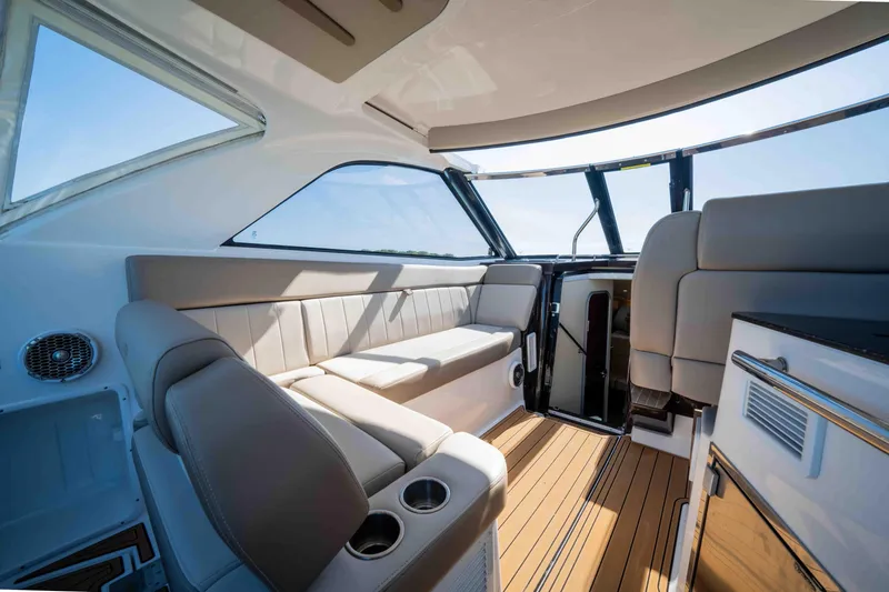 Slide: The Image of Interior of 2015 Regal 35 Sport Coupe with luxurious seating and modern design. - 42