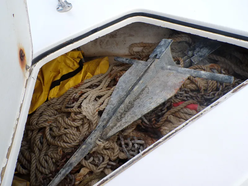 Slide: The Image of Anchor and ropes in storage compartment of 2002 Contender 31 Center Console boat. - 26