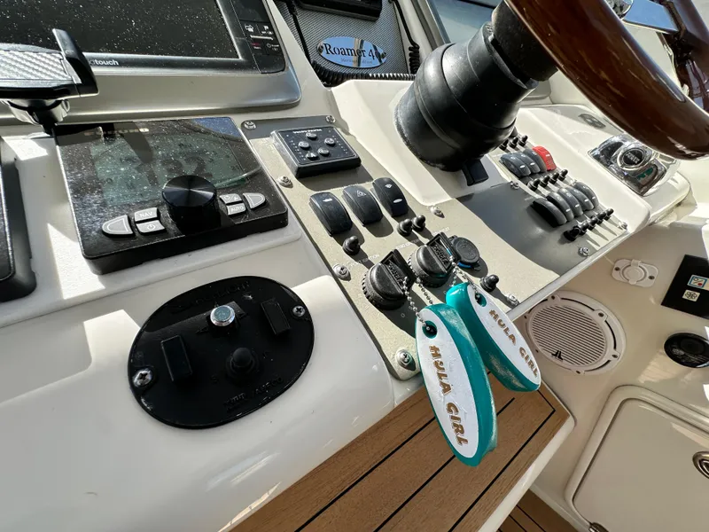 Slide: The Image of Control panel of a 2007 Chris-Craft Roamer 40 yacht with navigation instruments. - 25