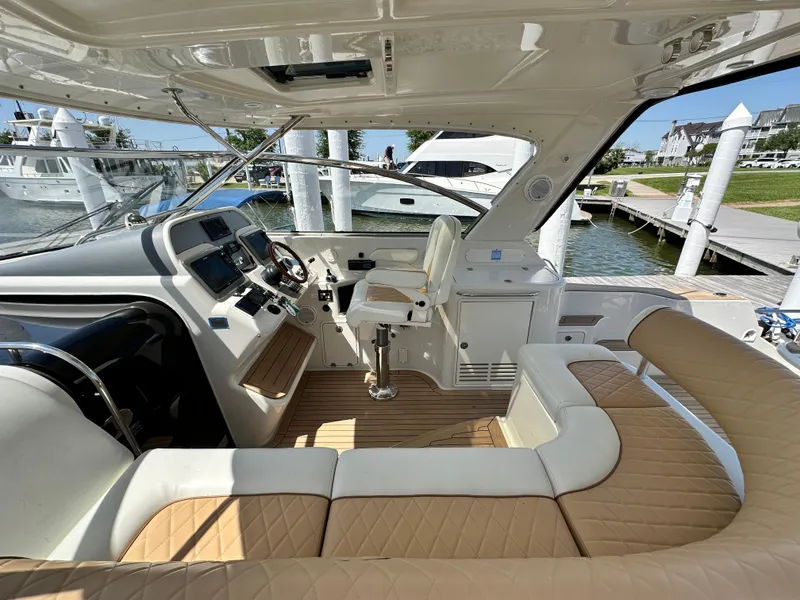 Slide: The Image of 2007 Chris-Craft Roamer 40 yacht interior with luxurious seating and modern helm controls. - 29