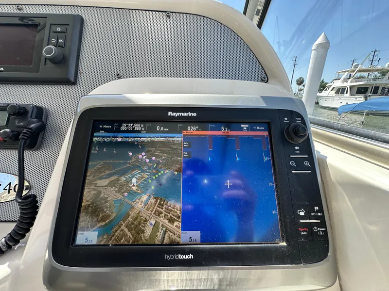 Slide: The Image of Raymarine navigation system on 2007 Chris-Craft Roamer 40 yacht, displaying maps and sonar. - 34