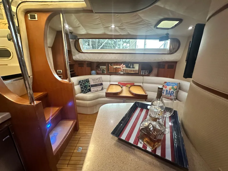 Slide: The Image of Luxurious interior of 2007 Chris-Craft Roamer 40 yacht with cozy seating and elegant decor. - 47