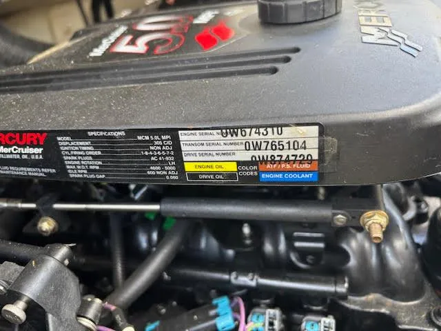 Slide: The Image of Close-up of a 2007 Sea Ray 200 Sundeck engine with visible serial numbers. - 17