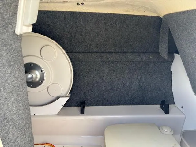 Slide: The Image of Interior storage compartment of a 2007 Sea Ray 200 Sundeck boat. - 31