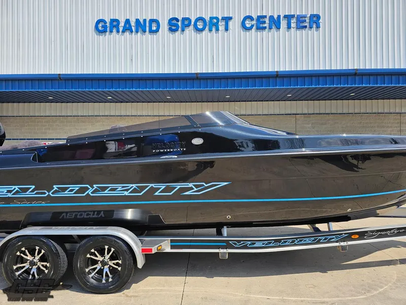 Slide: The Image of 2022 Velocity 290SC Signature Series boat at Grand Sport Center. - 3