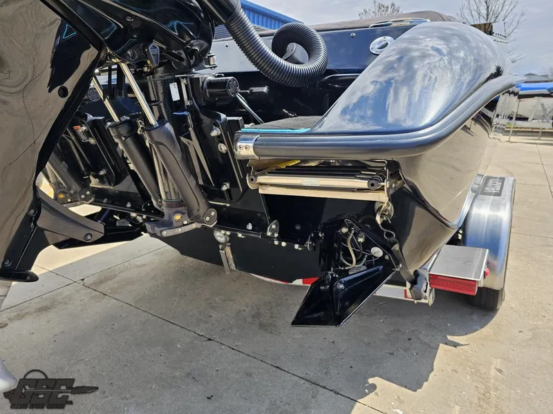 Slide: The Image of 2022 Velocity 290SC Signature Series boat trailer detail, showcasing hydraulic components and sleek design. - 33