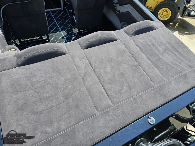 Slide: The Image of 2022 Velocity 290SC Signature Series boat interior with plush seating and modern design. - 38