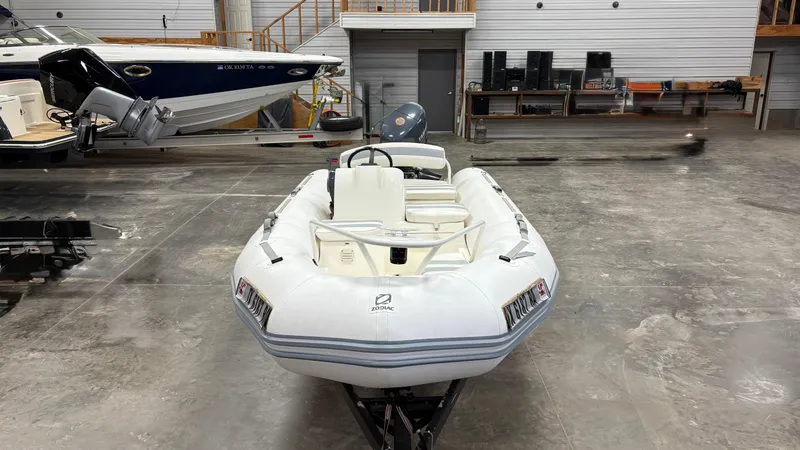 Slide: The Image of 2002 Zodiac Yachtline 420 Deluxe inflatable boat in a storage facility. - 19