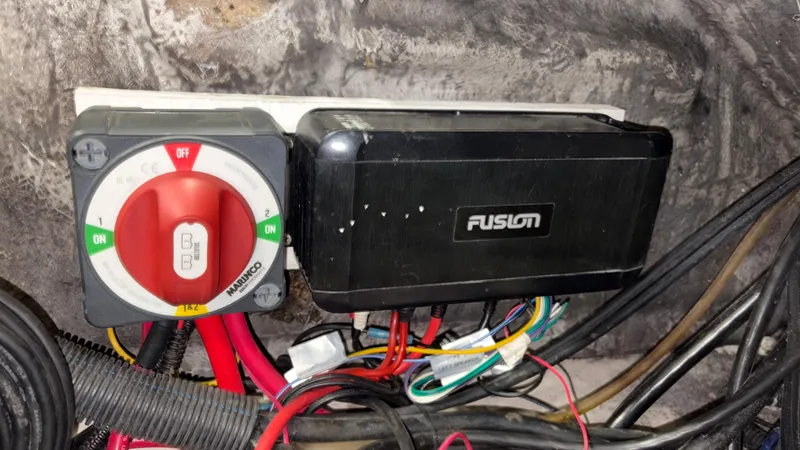 Slide: The Image of Electrical panel with Fusion device and wiring on 2002 Zodiac Yachtline 420 Deluxe. - 7