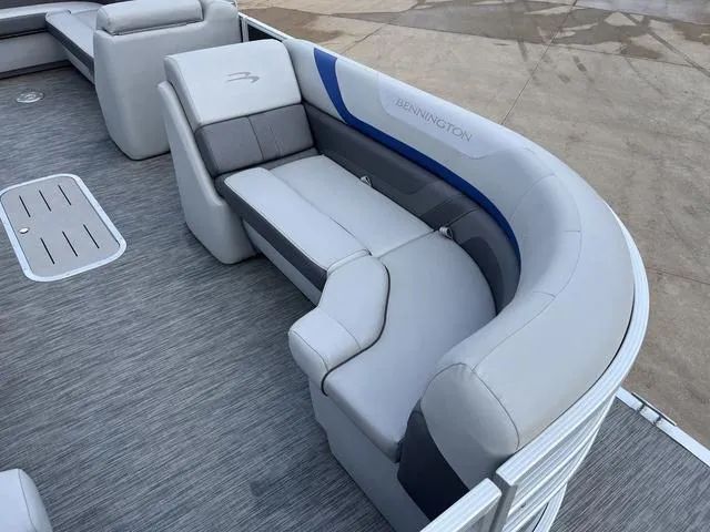 Slide: The Image of 2020 Bennington 22 SLX pontoon boat with luxurious gray seating and modern design. - 12